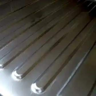 Scratched stainless steel sink after repair